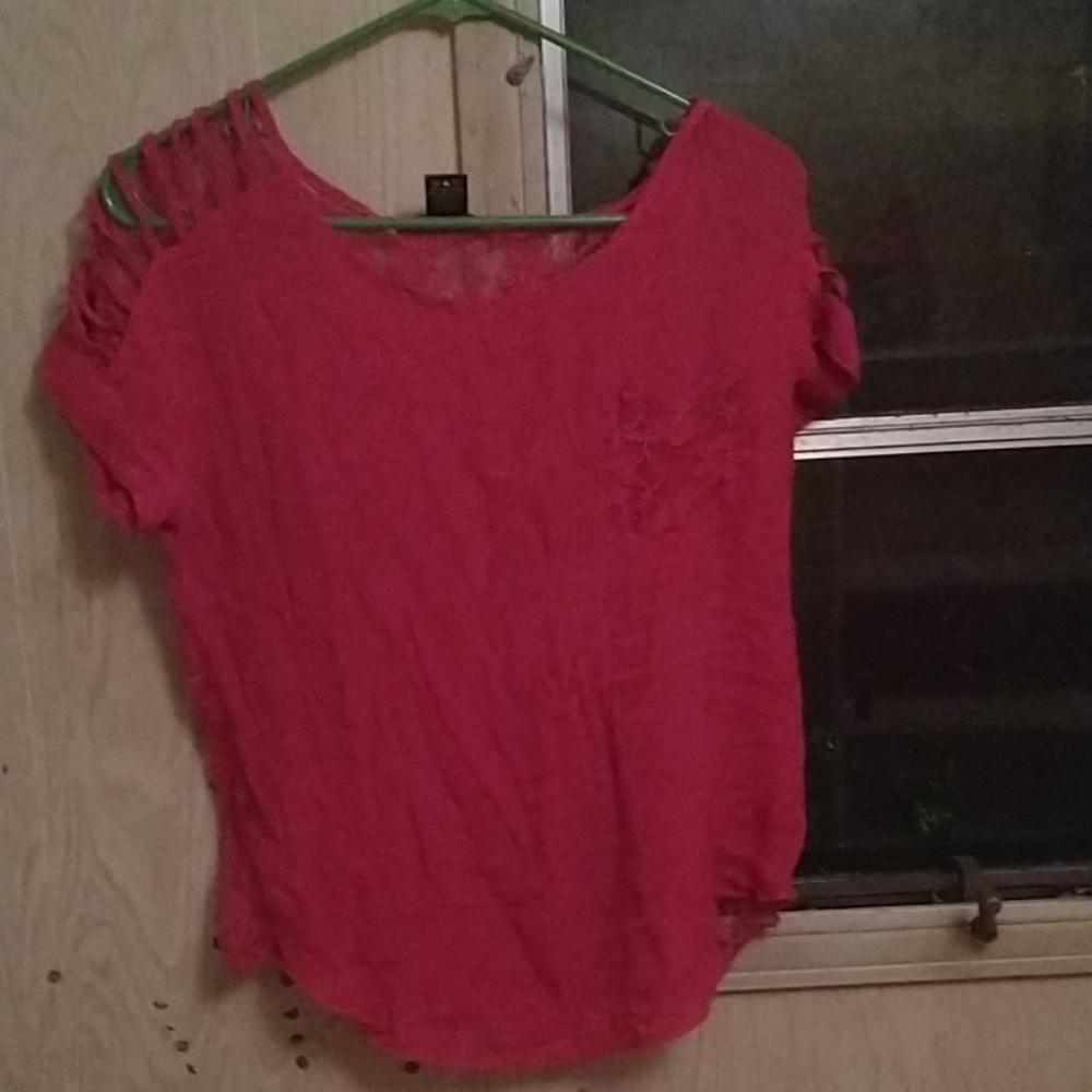 A pink shirt with mesh backing